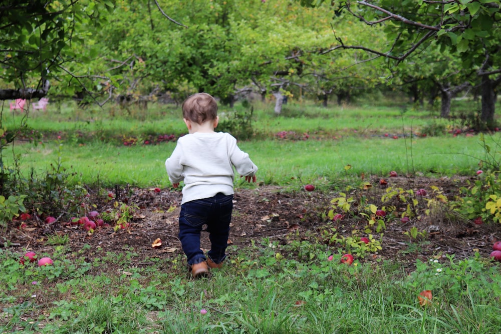 a child walking in a field