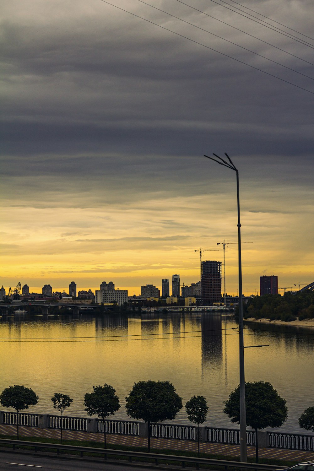 a city skyline with a river