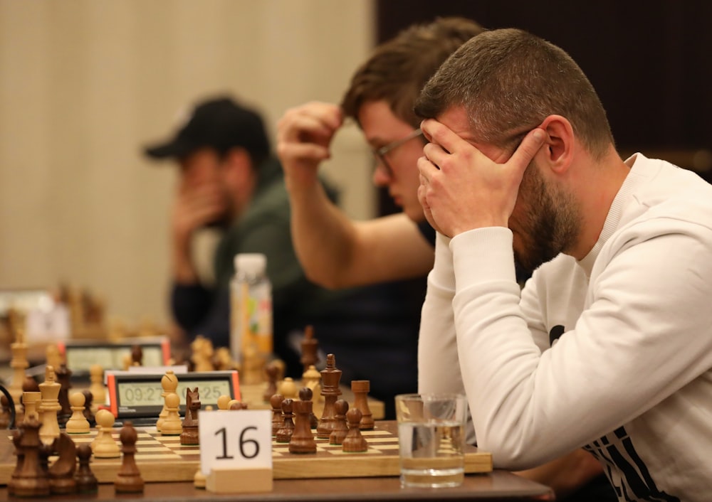 a man and a woman playing chess