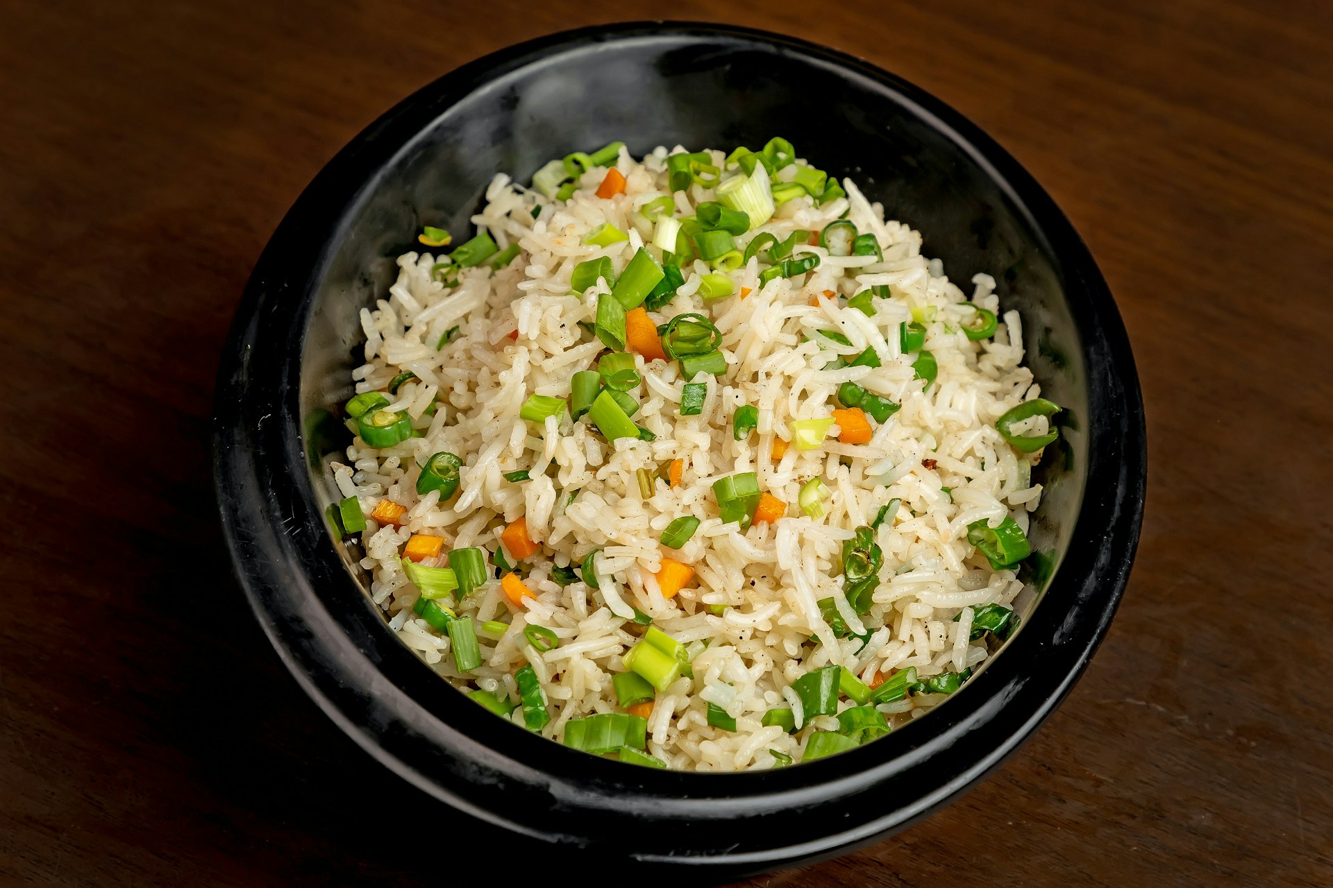a bowl of rice with vegetables