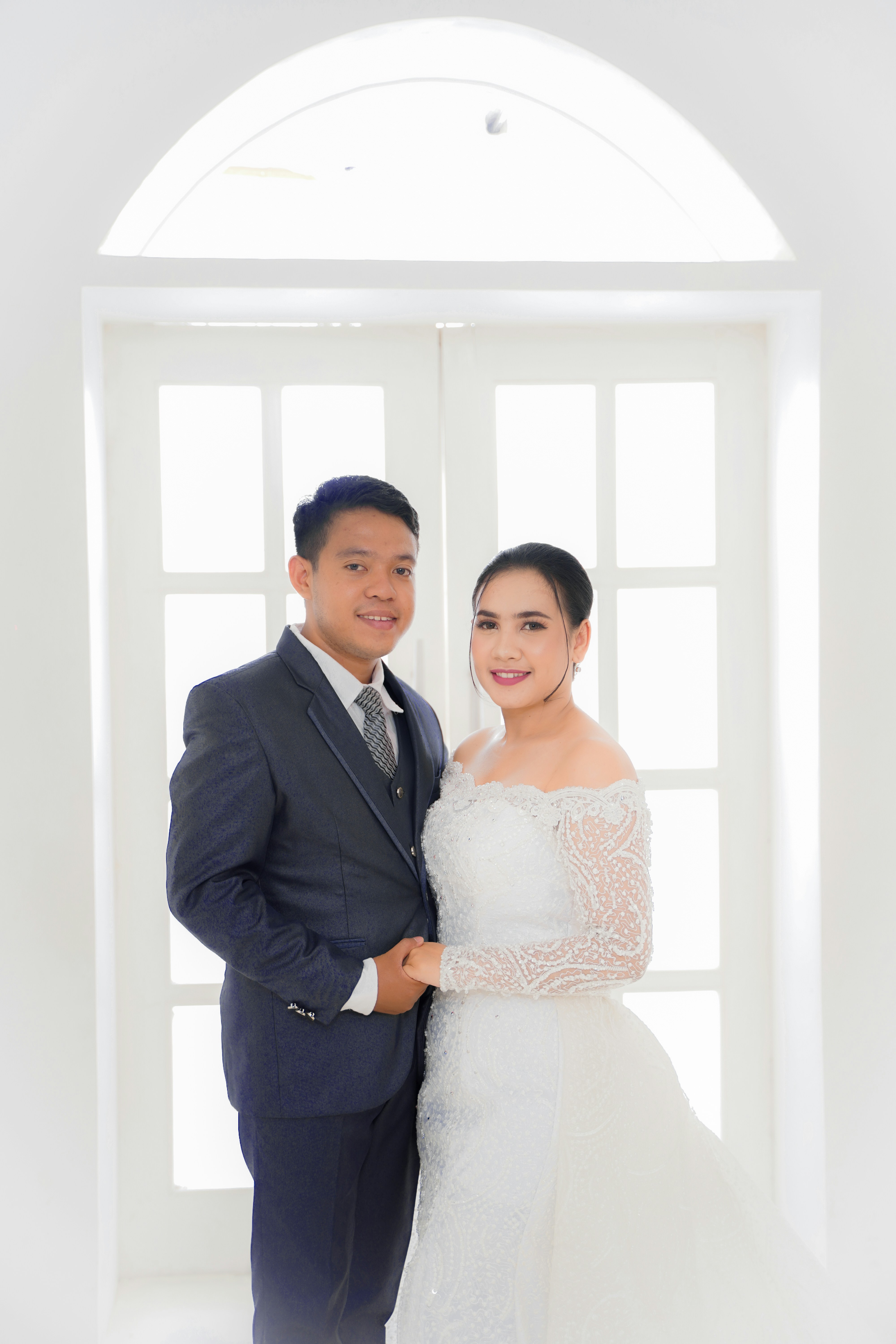 a man and woman posing for a picture