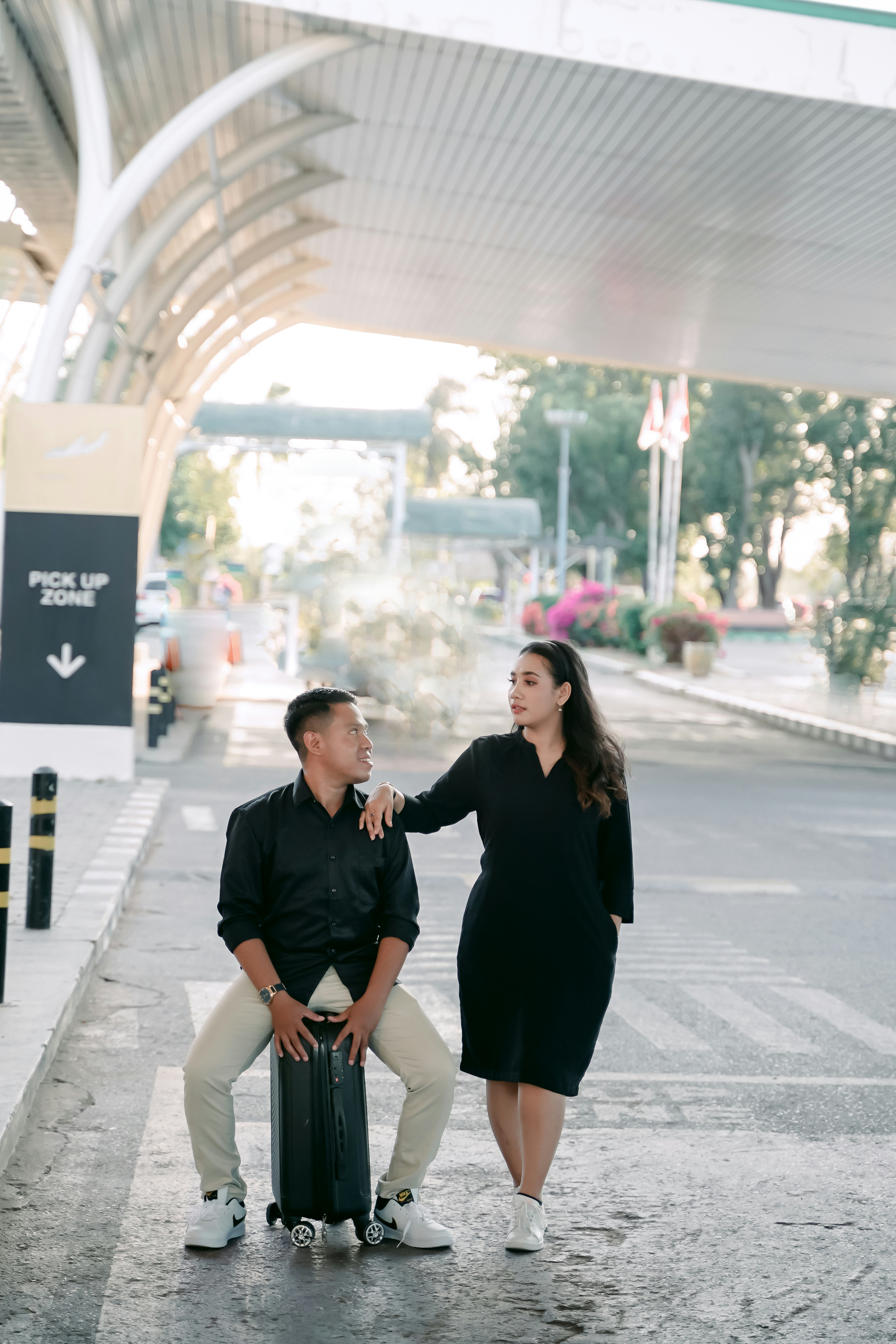a man and woman posing for a picture