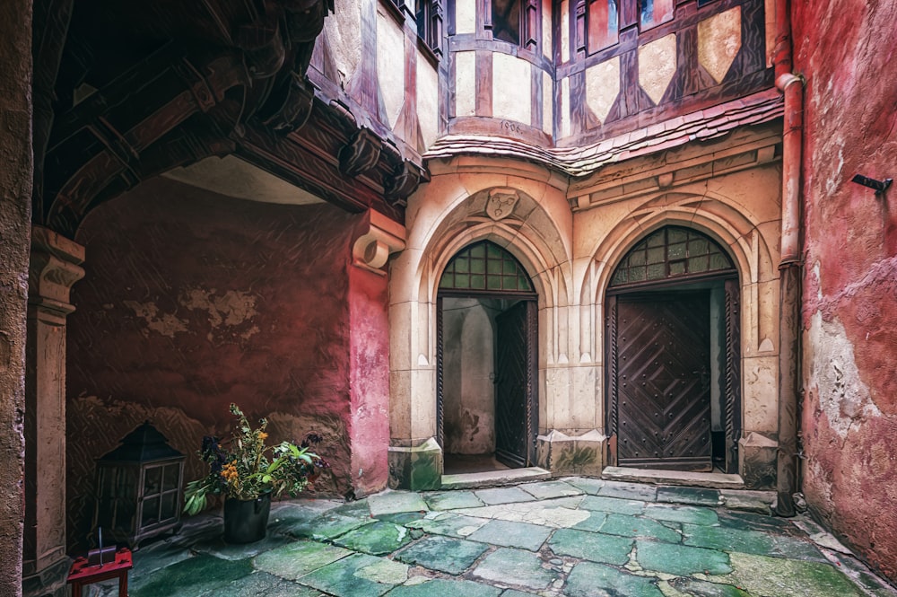 a stone courtyard with a stone walkway