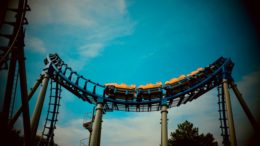 a roller coaster with people on it