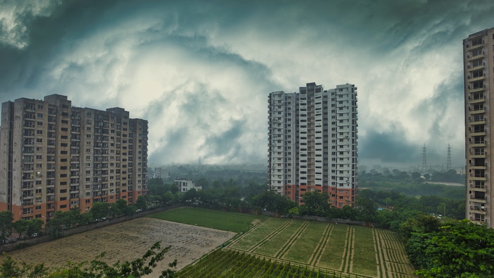 a large building with a green lawn