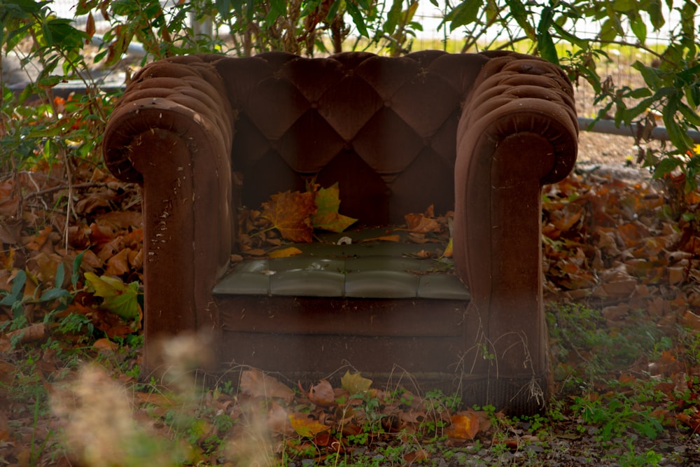 a rusty metal container with a fire inside