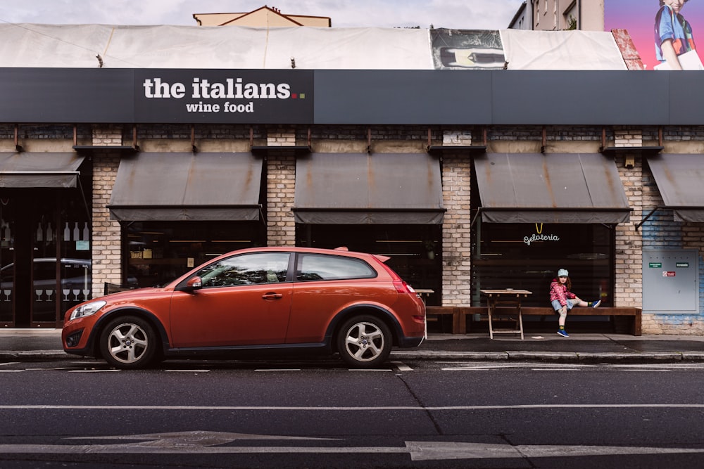 a car parked in front of a store