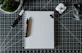a pen and a notebook on a table
