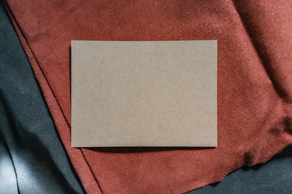 a piece of paper on a person's lap