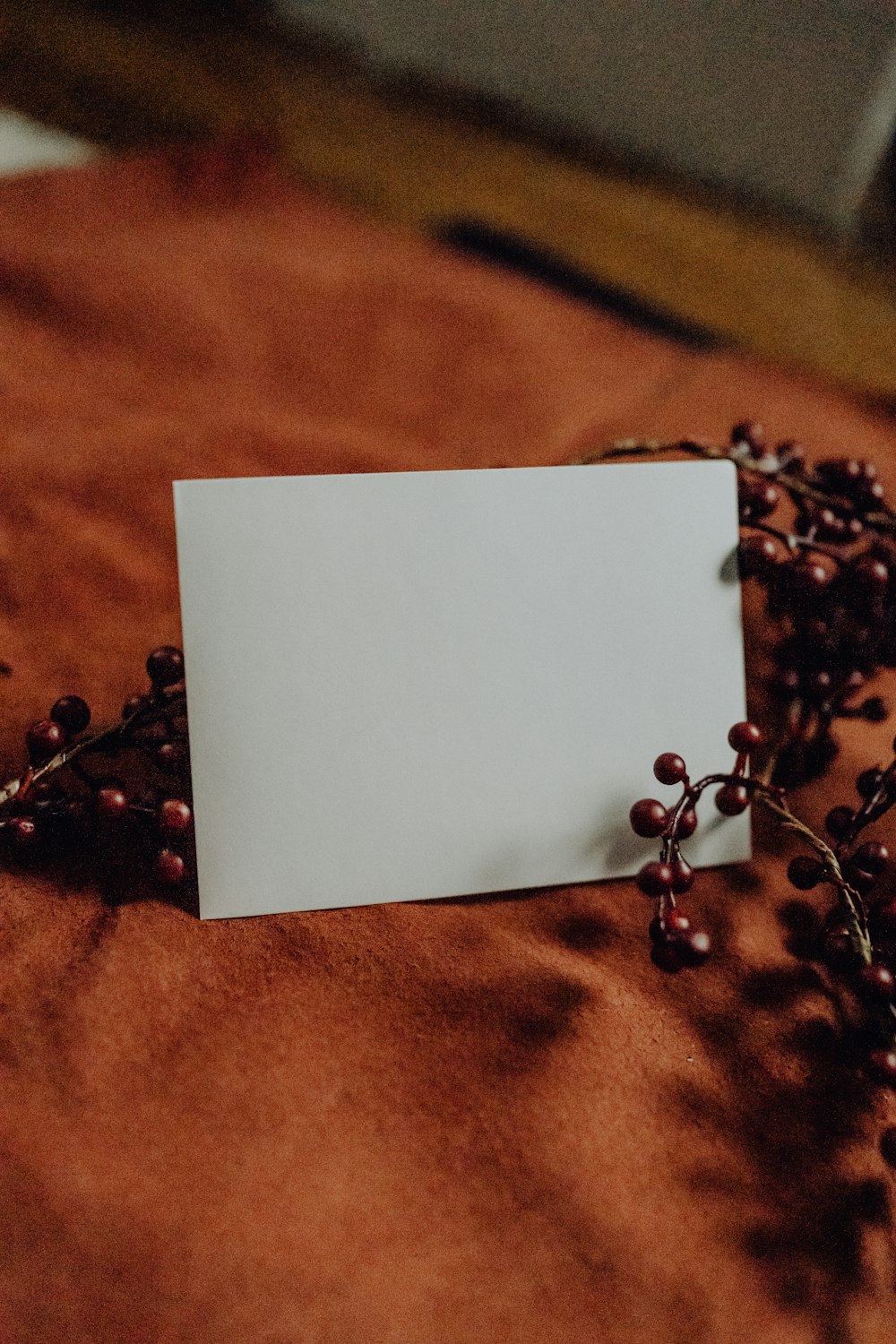 a white piece of paper on a chain