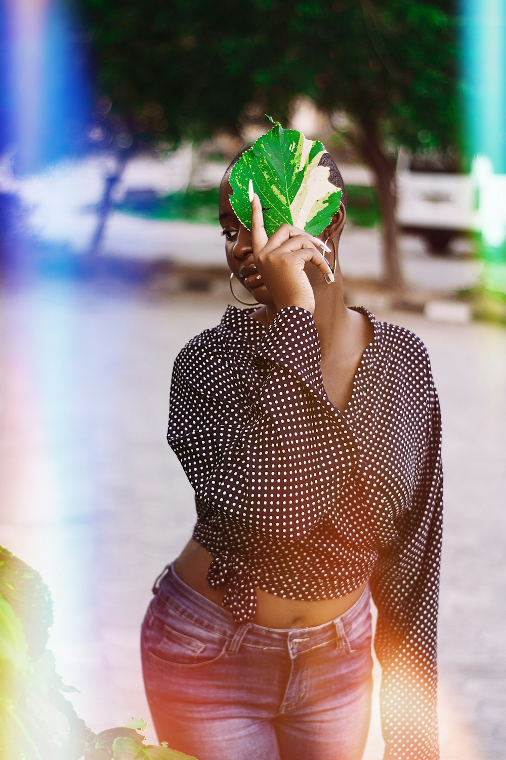 a woman holding a watermelon