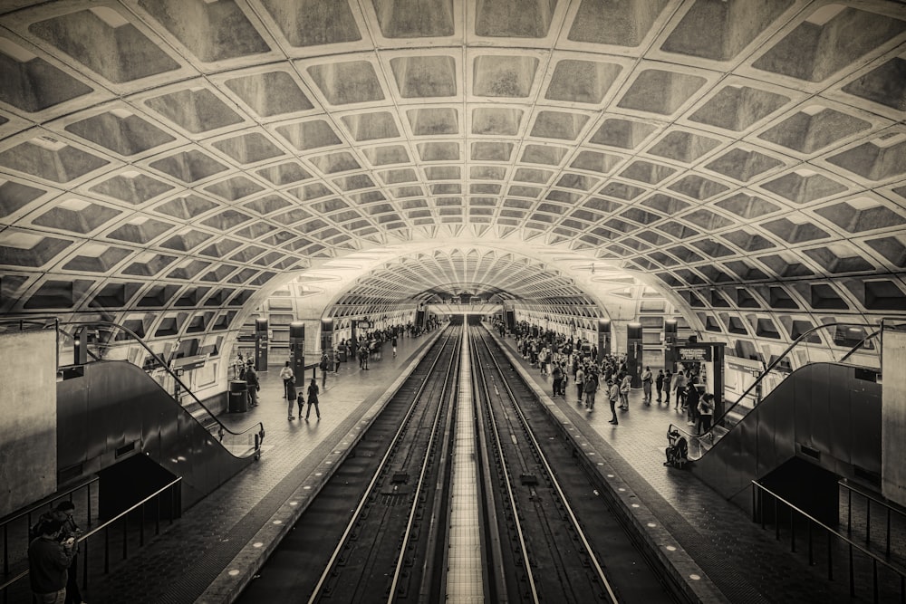 a train station with people