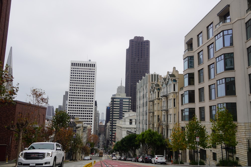 a city street with tall buildings