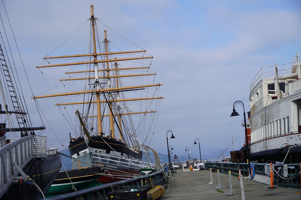 a large sailboat docked