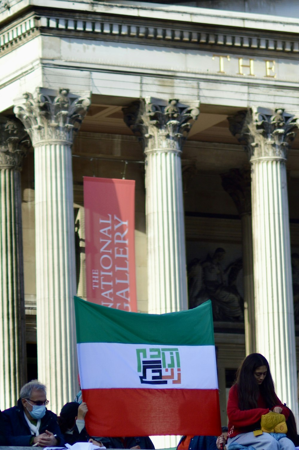 a flag in front of a building