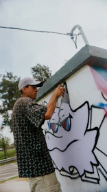 a person painting a wall