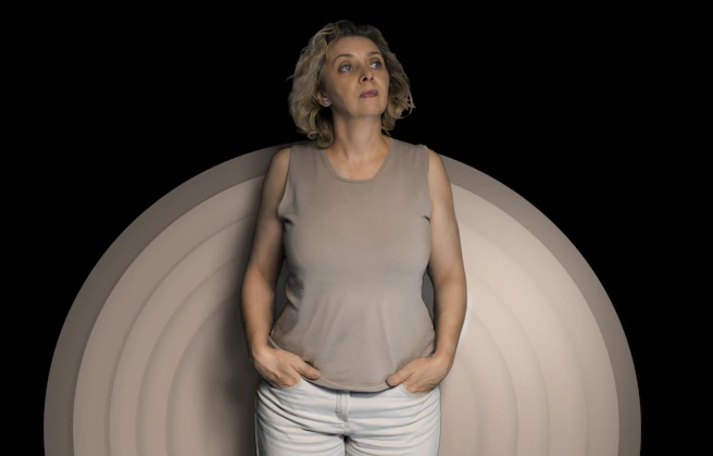 a man in a white dress