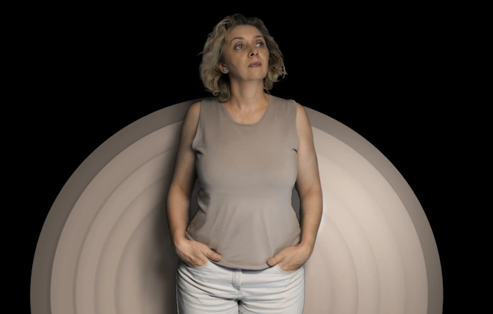 a man in a white dress