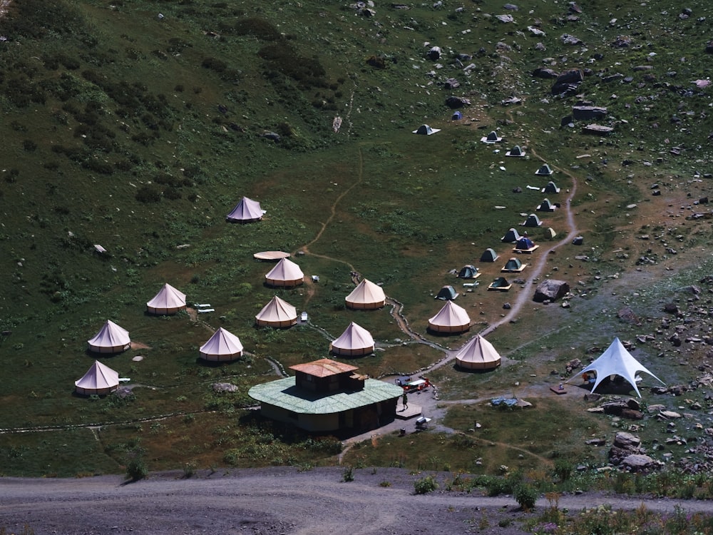 a group of tents in a field