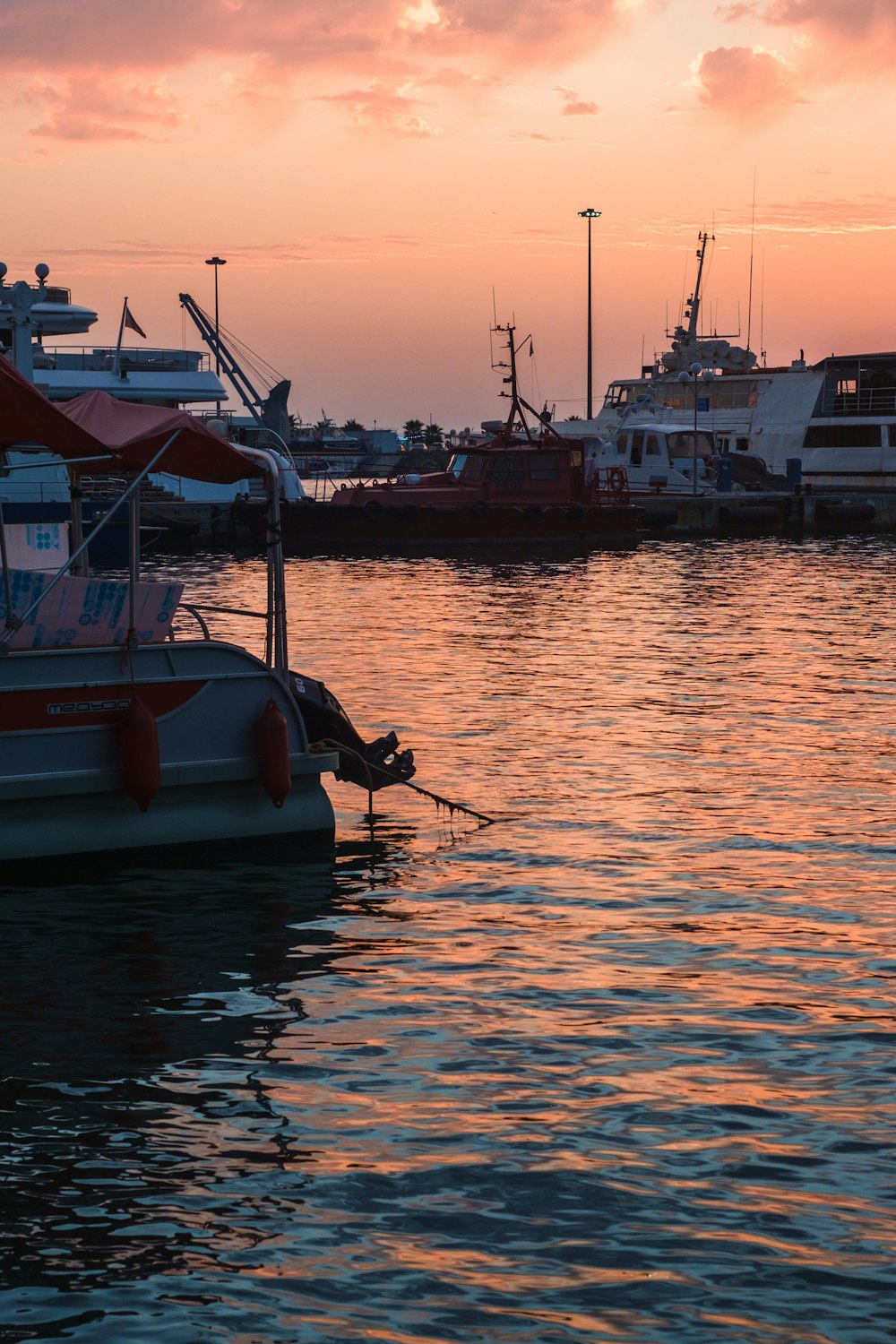 boats docked at a pier