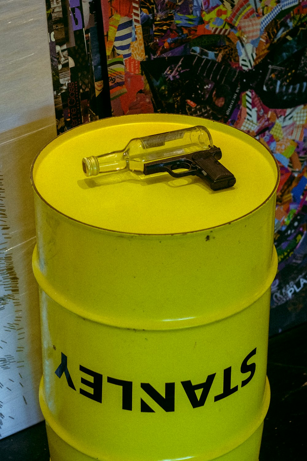 a yellow can with a pair of glasses on top
