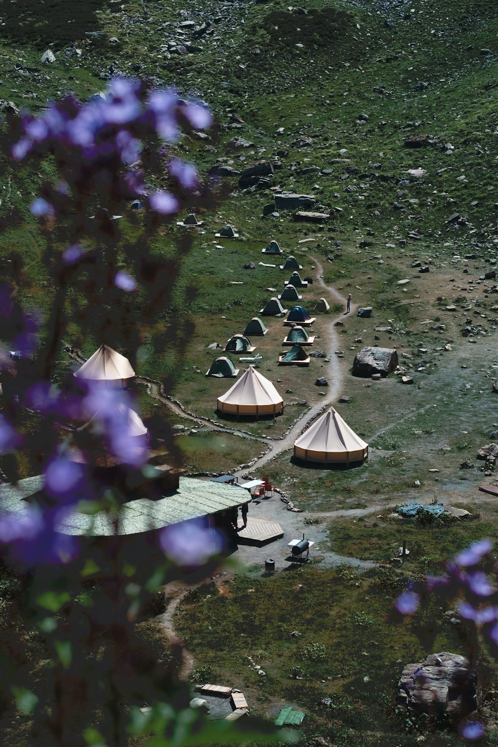a group of tents in a field