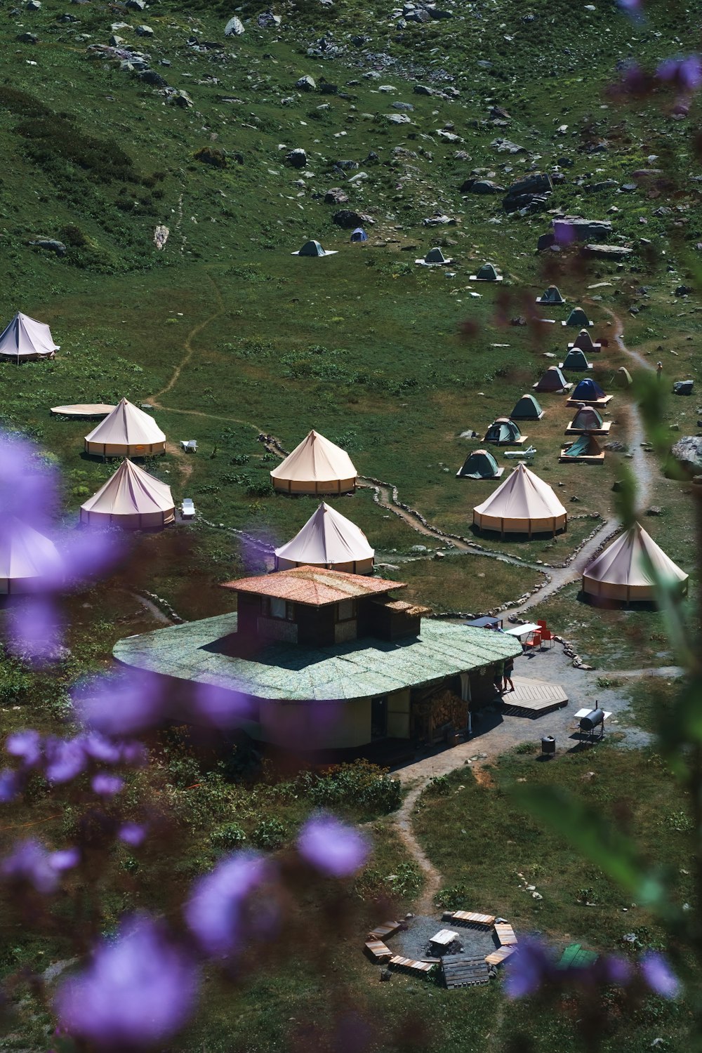 a group of tents in a field