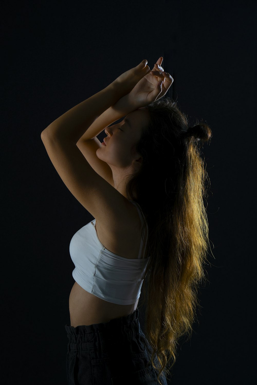 a woman with her hair blowing in the wind