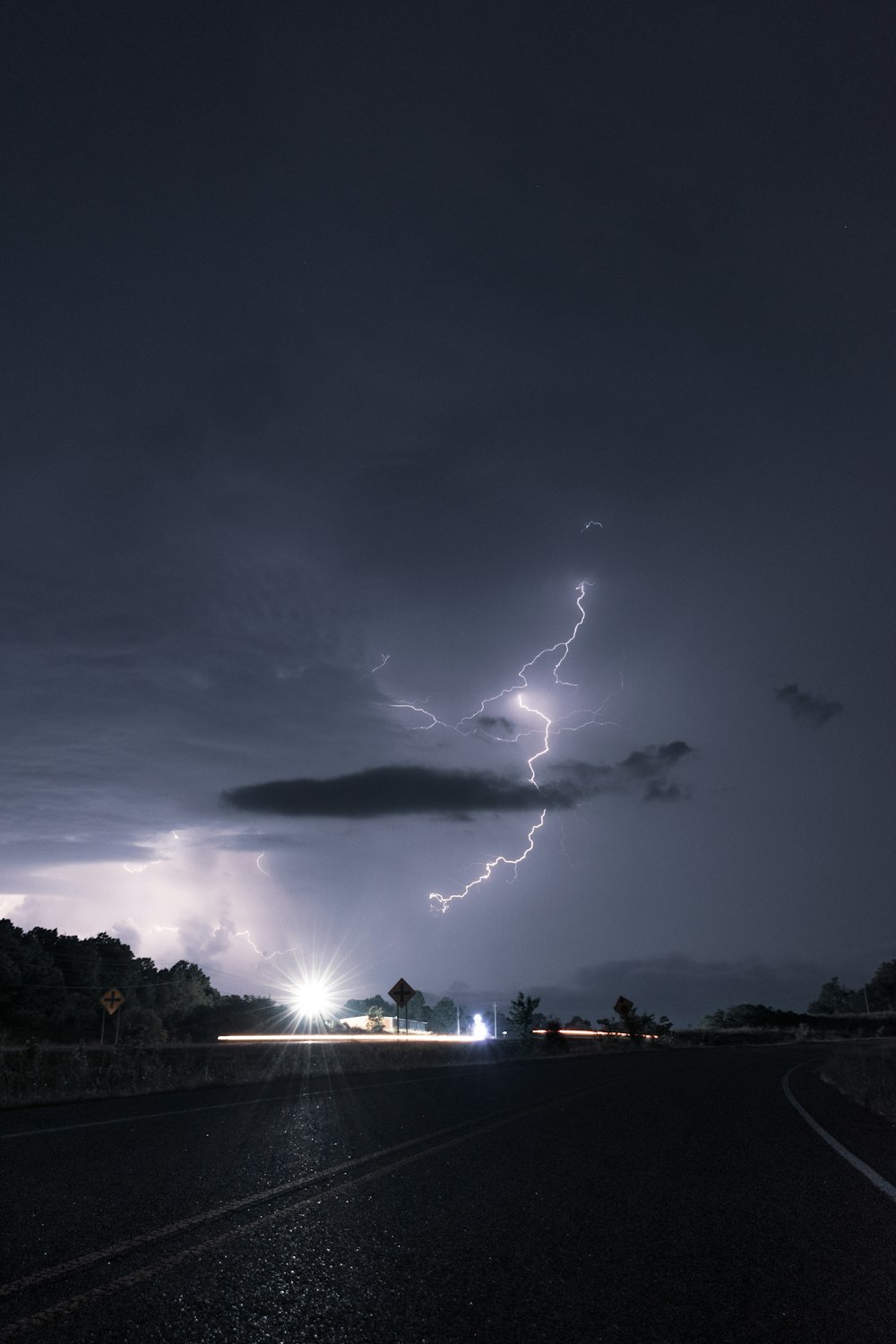 a lightning bolt striking a road