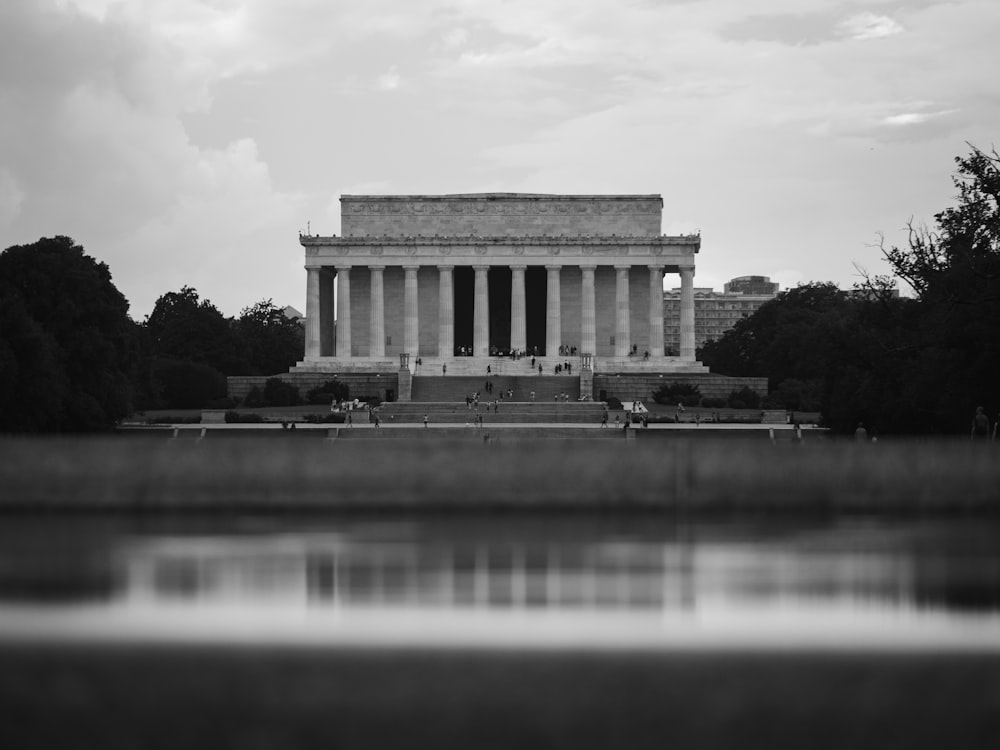 Lincoln Memorial with columns and a body of water in front of it