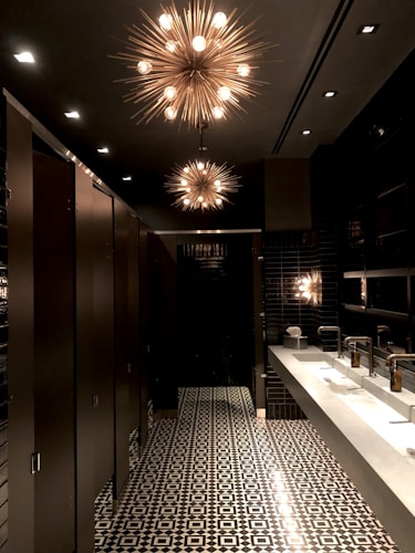 a room with a chandelier and a table