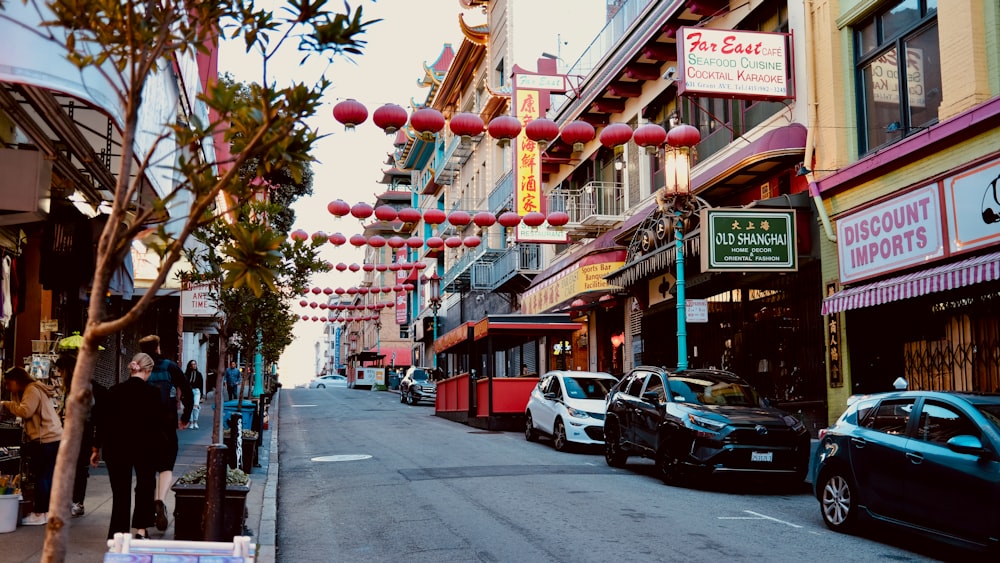 a street with cars and buildings on either side of it