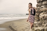 a woman standing on a beach