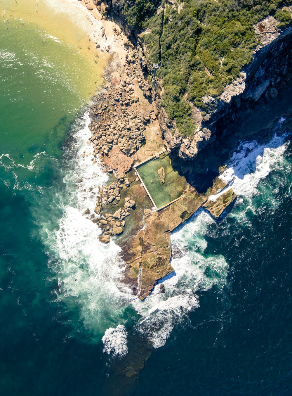 a beach with a body of water