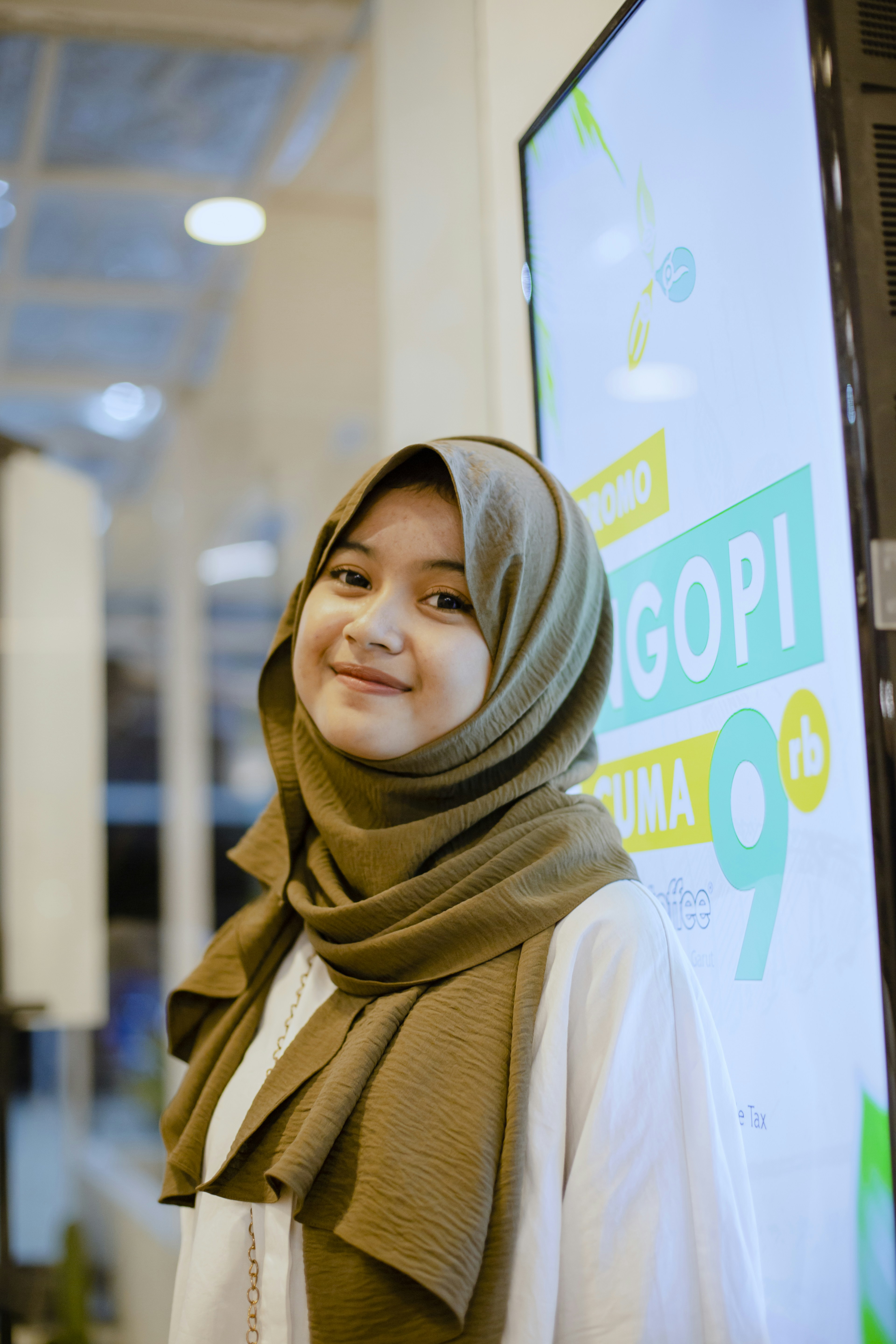 seseorang yang mengenakan syal