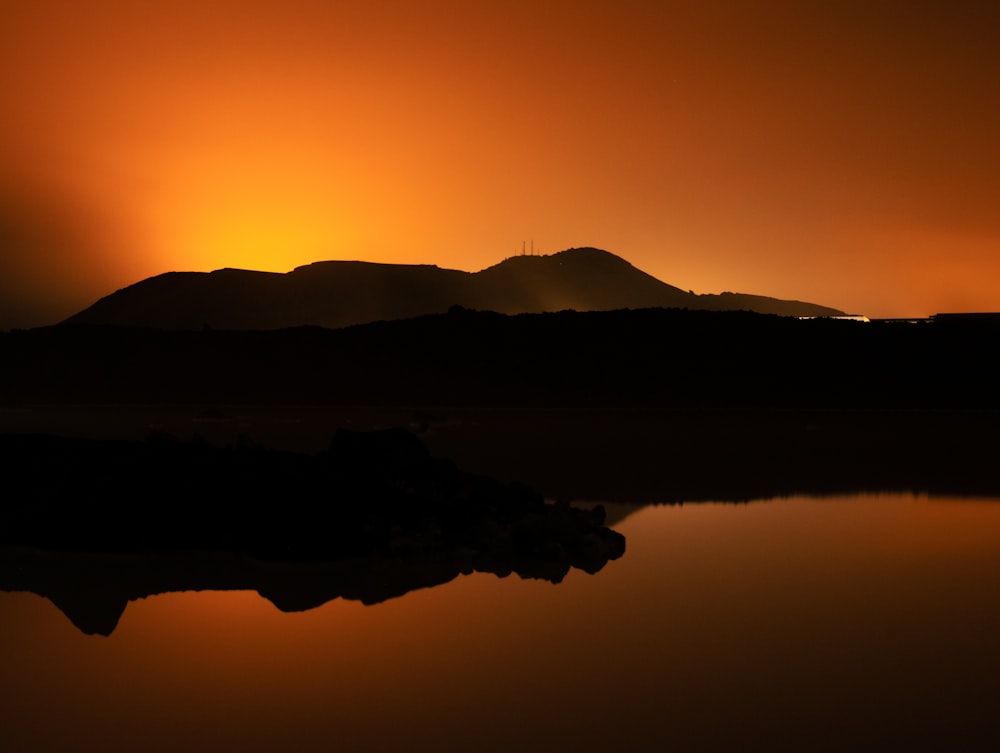 a sunset over a lake