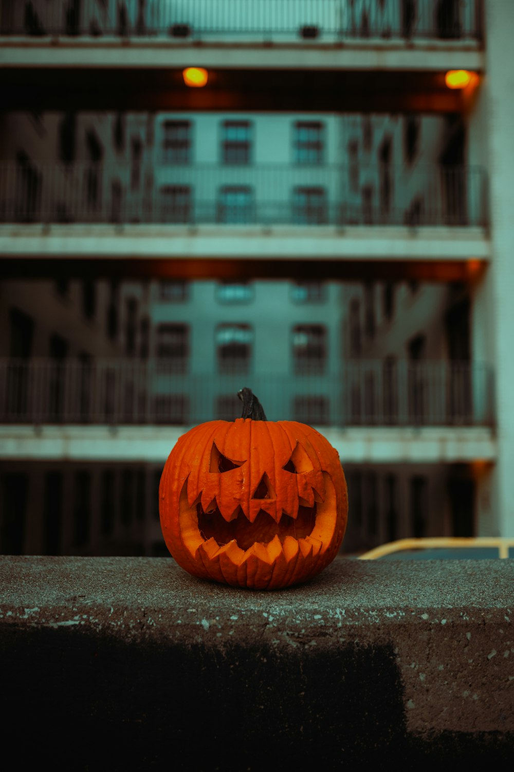 a pumpkin on a ledge