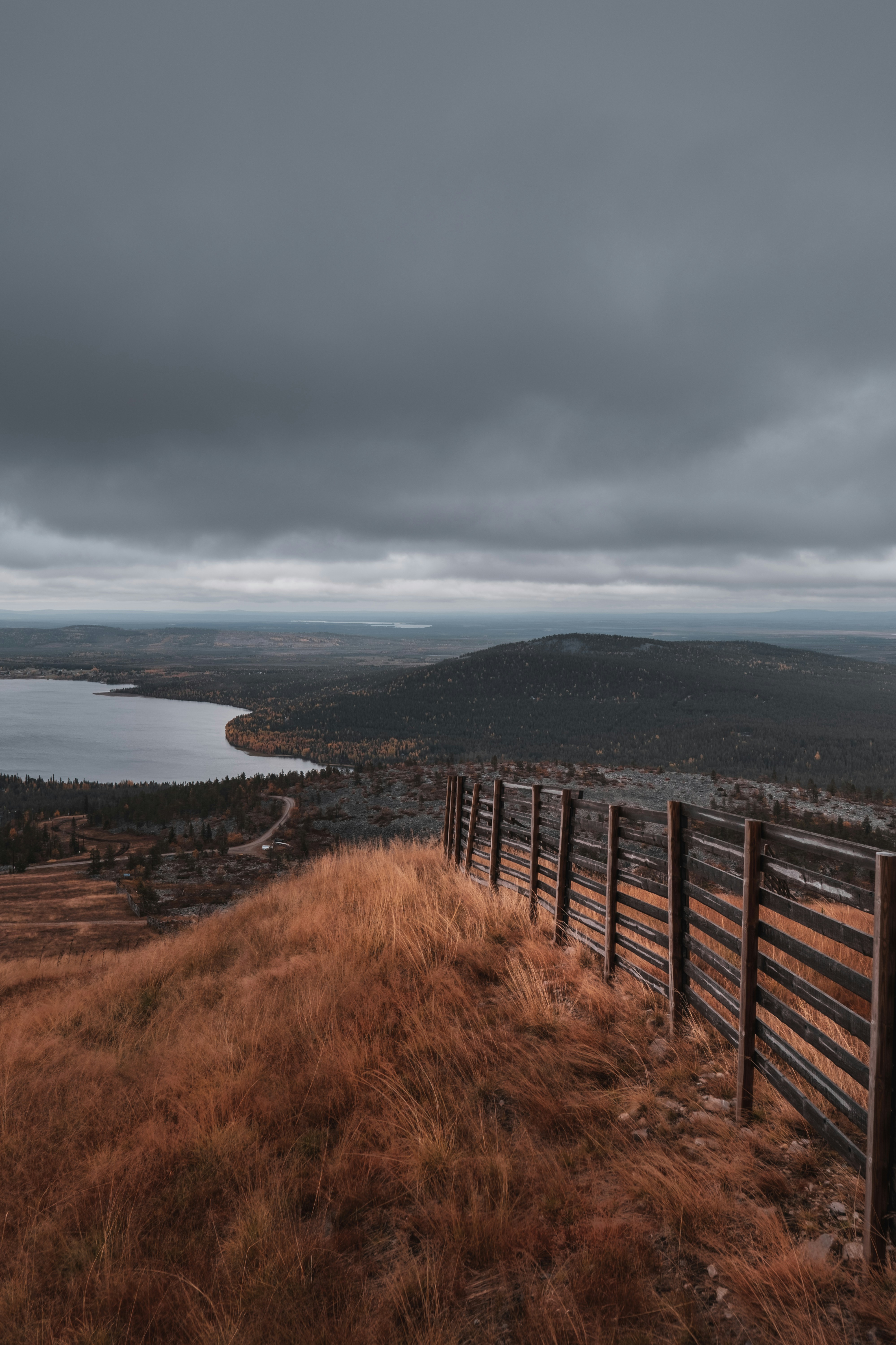 a fence overlooking a body of water