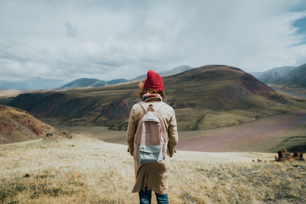 a person standing on a hill