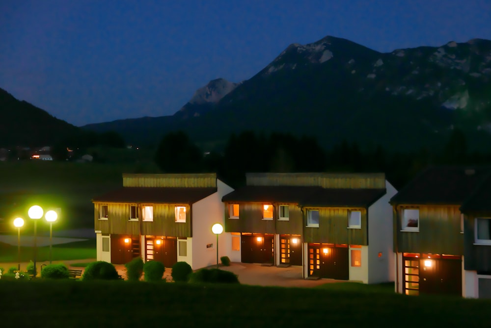 a house with lights on at night