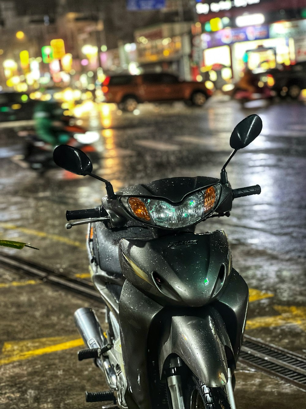 a motorcycle parked on the side of a street