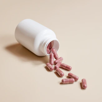 a white bottle of medicine