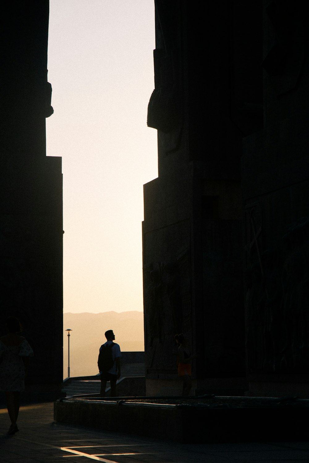 people standing in a large building