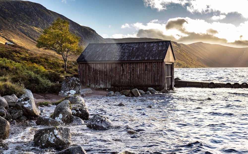 a building on a rocky shore