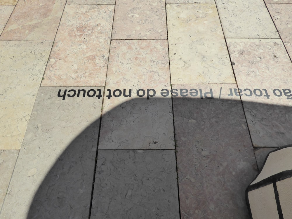 a stone walkway with text