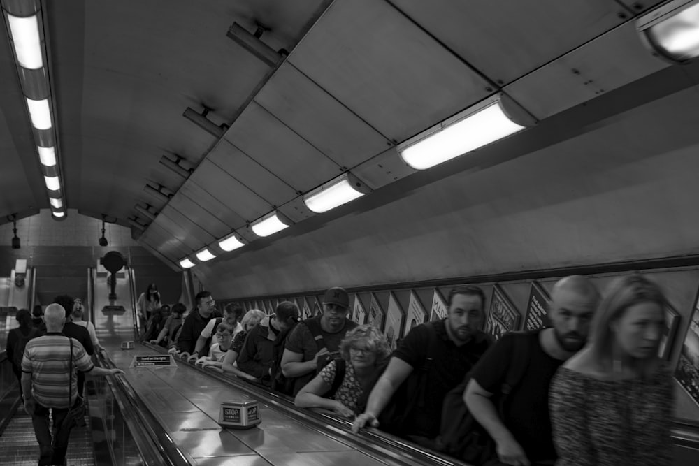 a group of people in a subway station