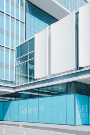 A modern design of a building drawing displayed in a stylish gallery.