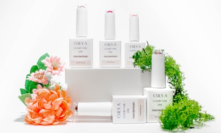 a group of bottles and flowers