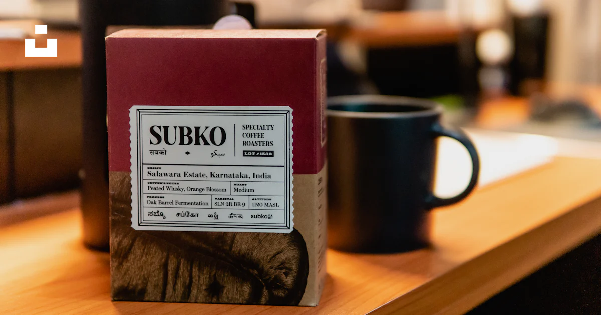 A mug and a box on a table photo – Free Subko specialty coffee roasters ...
