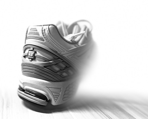 Close-up of a sports shoe sole showcasing advanced cushioning technology with dynamic lighting.